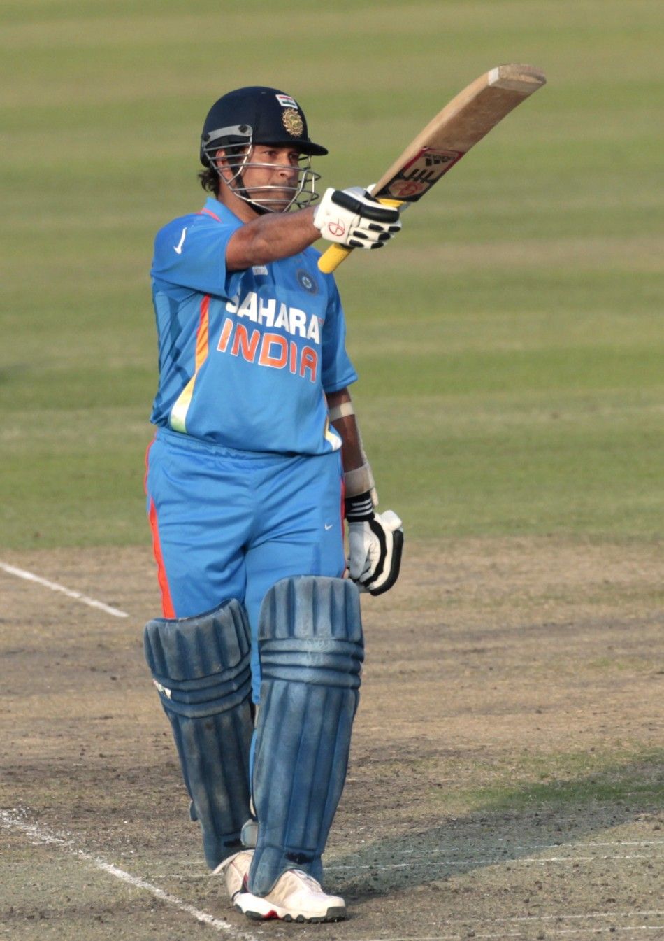 Indias Sachin Tendulkar celebrates after he scored his 100th centuries against Bangladesh during their One Day International ODI cricket match of Asia Cup in Dhaka March 16, 2012. 