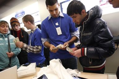 People purchase Apple's new iPad in New York
