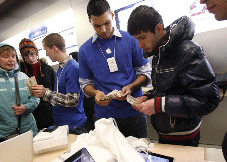 People purchase Apple's new iPad in New York