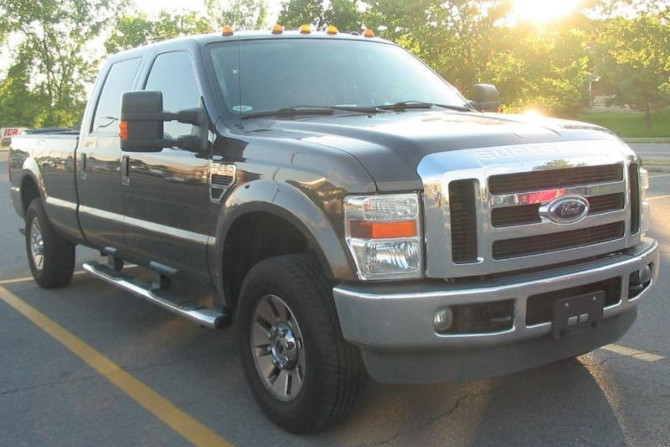 A parked 2008 Ford F-250 truck.