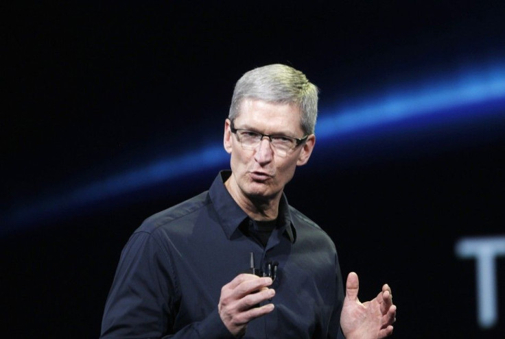 Apple CEO Tim Cook speaks on stage during an Apple event introducing the new iPad in San Francisco, California March 7, 2012.