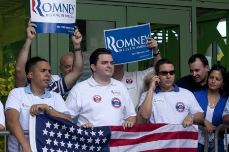 Supporters of U.S. Republican presidential candidate and former Massachusetts Governor Mitt Romney wait outside a market place to greet him on his last day of a two day campaign visit in Bayamon March 17, 2012.