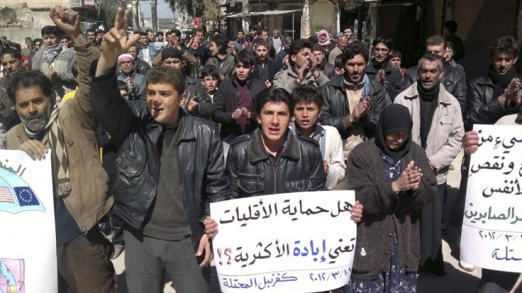 Demonstrators protest against Syria&#039;s President Bashar Al-Assad in Kafranbel near Idlib.