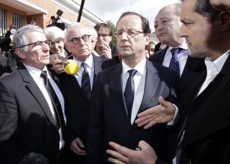 Francois Hollande, Socialist party candidate for the French 2012 presidential elections, speaks to the media outside the Ozar Hatorah Jewish school after shooting in Toulouse