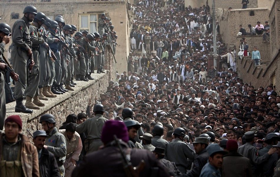 Afghan police control the crowd during the celebration of the Afghan New Year Nawruz in Kabul March 21, 2010. Afghanistan uses the Persian calendar, which runs from the vernal equinox. The calendar takes as its start date the time when the Prophet Moham