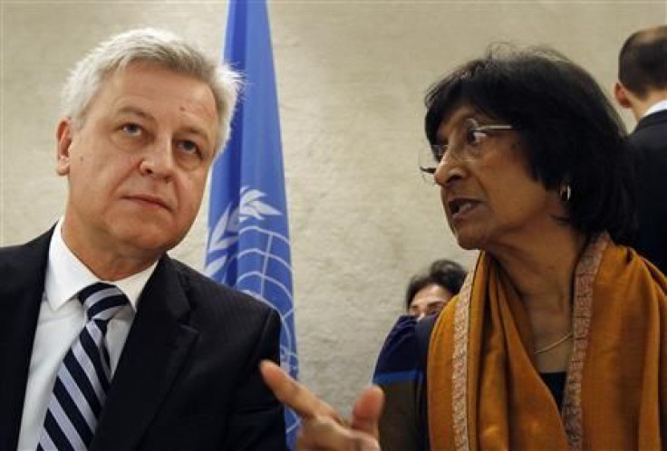 Remigiusz Henczel of UNHCR and Navi Pillay of U.N. High Commission for Human Rights