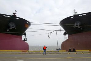 Two Capesize bulkers anchored in a Shanghai port