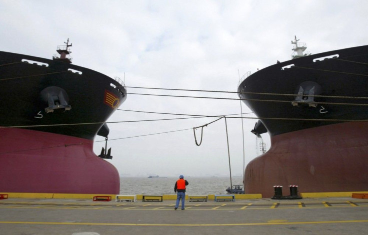 Two Capesize bulkers anchored in a Shanghai port