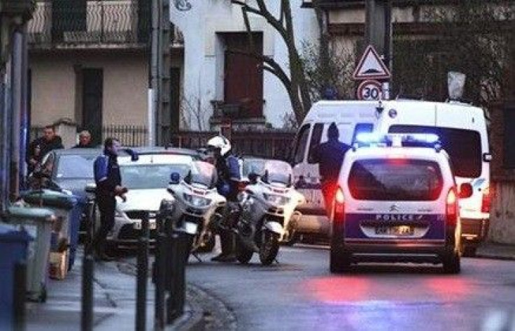 Toulouse French shooting gunman holed up