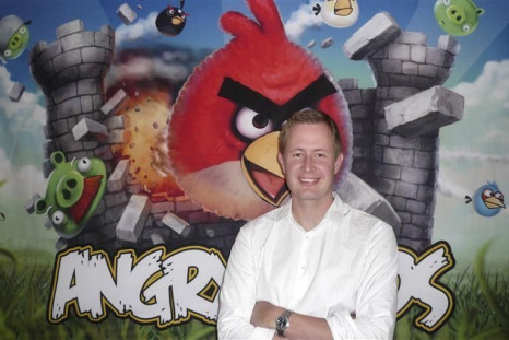 Rovio Chief Executive Mikael Hed stands in front of an Angry Birds poster at his company&#039;s offices in Helsinki August 16, 2010.