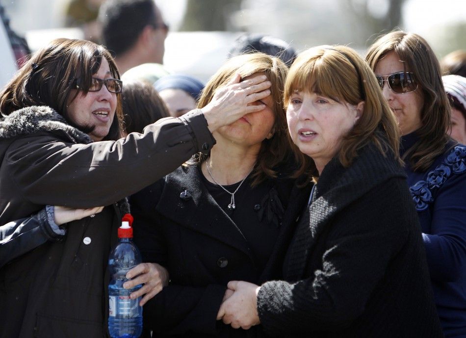 Mourners attend a joint funeral in Jerusalem for victims of Mondays shooting in Toulouse