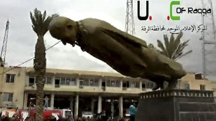 Assad statue torn down 