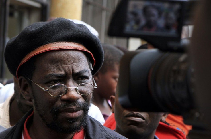 Munyaradzi Gwisai, a former opposition lawmaker in Prime Minister Morgan Tsvangirai&#039;s party speaks to the media at the Harare Magistrate court March 20, 2012.