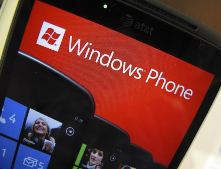 An AT&T phone running the Windows Phone operating system is shown for sale at a Microsoft retail store in San Diego