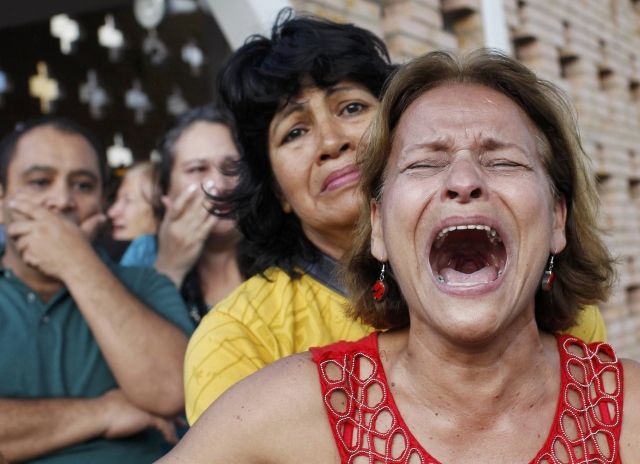 Supporters of Chavez mourn his death