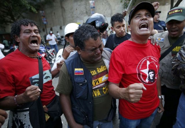 Supporters mourning the death of Chavez