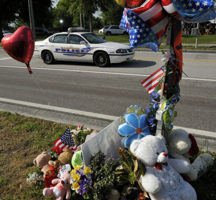 A view of a memorial dedicated to Trayvon Martin near the site where he was killed in front of The Retreat at Twin Lakes community in Sanford, Florida March 22, 2012.