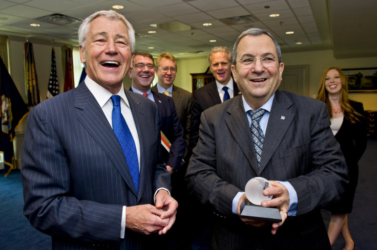 Hagel presentes Barak with a gift at the Pentagon