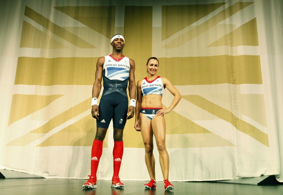 Triple jumper Phillips Idowu L and heptathlete Jessica Ennis pose wearing the new Team GB kits designed by British designer Stella McCartney C for the London 2012 Olympic Games, at a media viewing in London March 22, 2012.