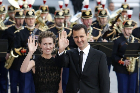 Syria's President Assad and wife arrive at a dinner during a EU-Mediterranean summit in Paris in 2008.