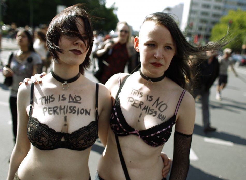 Two women participate in SlutWalk rally against sexual abuse in central Berlin