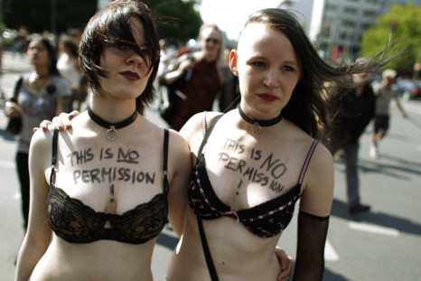 Two women participate in SlutWalk rally against sexual abuse in central Berlin