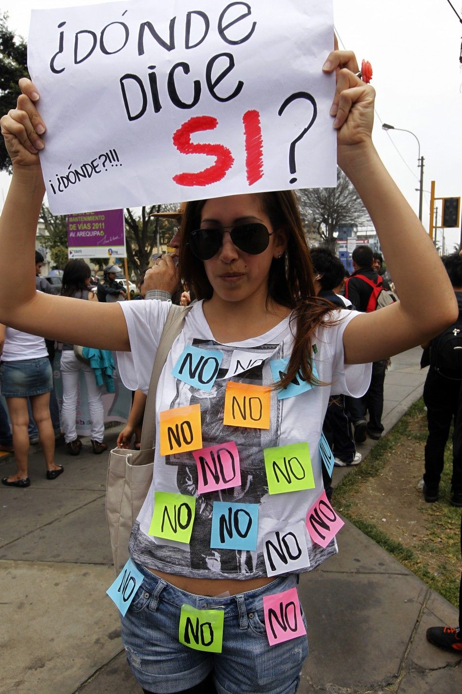 A woman takes part in the SlutWalk, held to protest against discrimination and violence against women in Lima