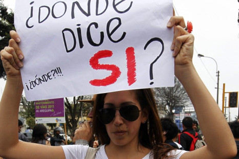 A woman takes part in the SlutWalk, held to protest against discrimination and violence against women in Lima