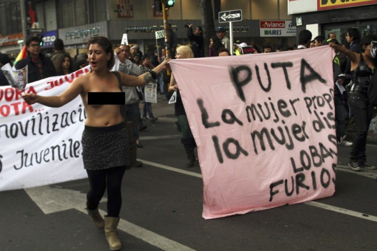 A woman takes part in a so-called March of the W----s