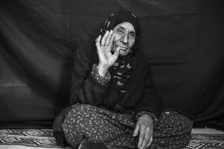 Elderly Refugee Woman With Her Ring