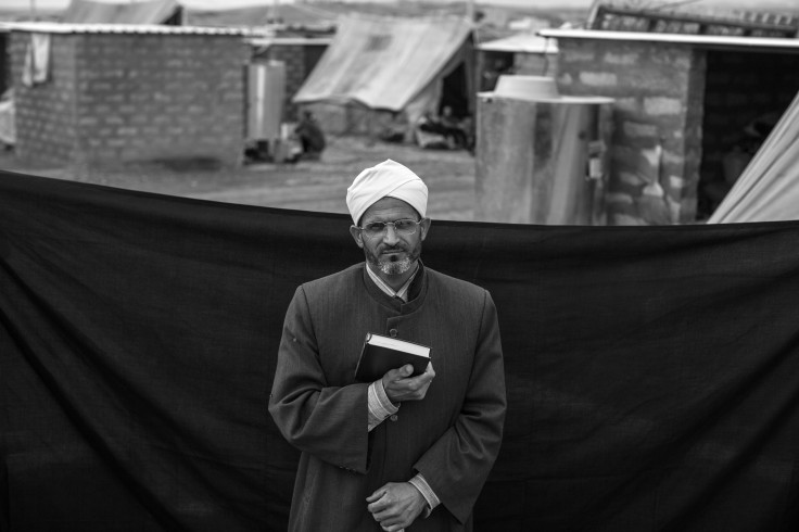 Syrian Refugee Imam With His Koran