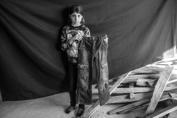 Syrian Refugee Girl With Her Favorite Jeans