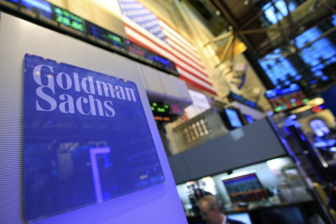 A Goldman Sachs sign is seen on at the company's post on the floor of the New York Stock Exchange, Jan. 18, 2012