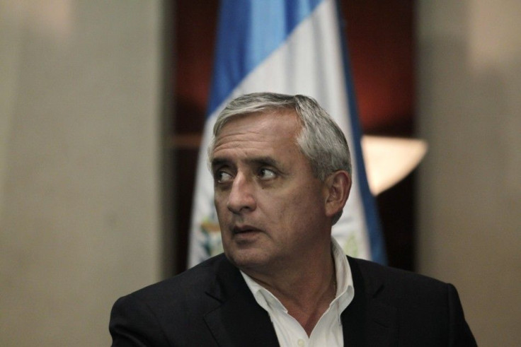 Guatemalan President Otto Perez Molina attends a news conference in the TSE in Guatemala City