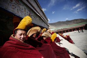 Photo above shows Tibetan monks praying in Gansu Province, China on February 21, 2012