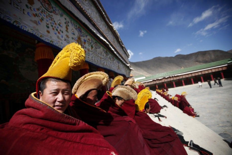 Photo above shows Tibetan monks praying in Gansu Province, China on February 21, 2012