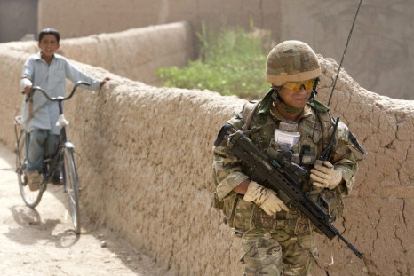 British soldier on patrol outside military base near Lashkar Gah in southern Afghanistan