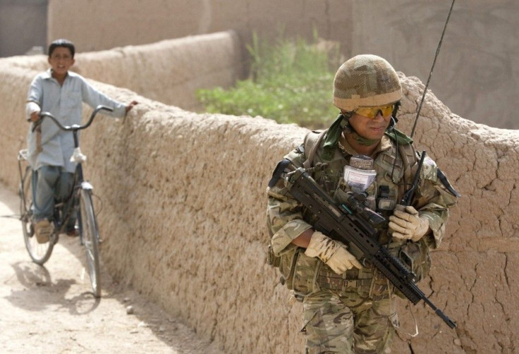 British soldier on patrol outside military base near Lashkar Gah in southern Afghanistan