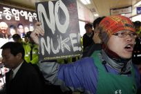 An anti-nuclear activist shouts slogans during a protest in Seoul