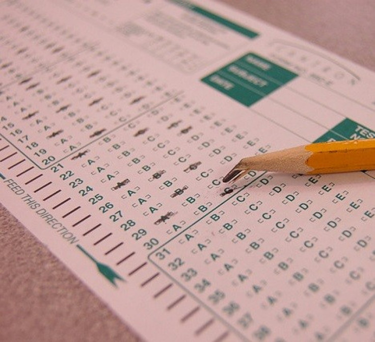 The College Board, which runs the SAT and the ACT test companies, will introduce these worldwide initiatives and others later on Tuesday in the wake of a massive cheating scheme in New York involving 20 current and former high school students.