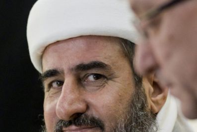 Defendant Iraqi-born cleric Mullah Krekar sits in a courtroom in Oslo.