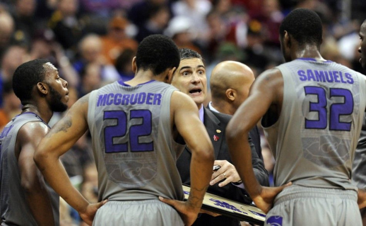 Kansas State Wildcats head coach Martin talks with his team during the quarterfinals of the NCAA Men's Big 12 basketball championship in Kansas City