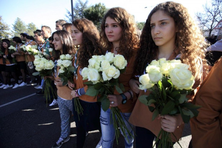 Students of the Ozar Hatorah school lead silent march through streets of Toulouse in honour of dead