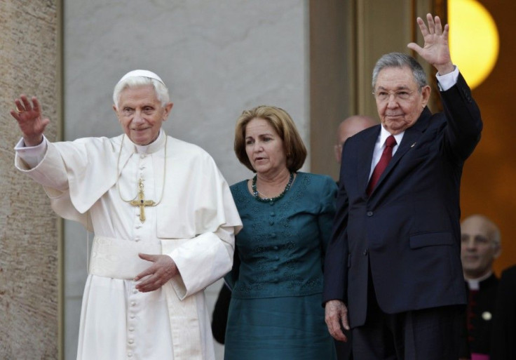 Pope Benedict XVI is welcomed by Cuban President Raul Castro at Revolution Palace in Havana.