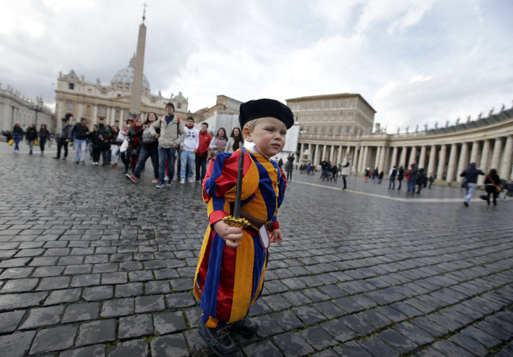 Child dressed as Swiss Guard
