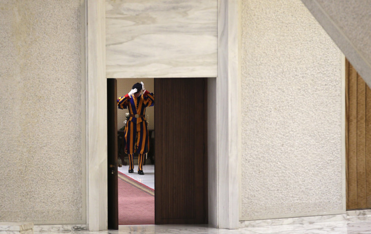 Swiss Guard adjusts his cap