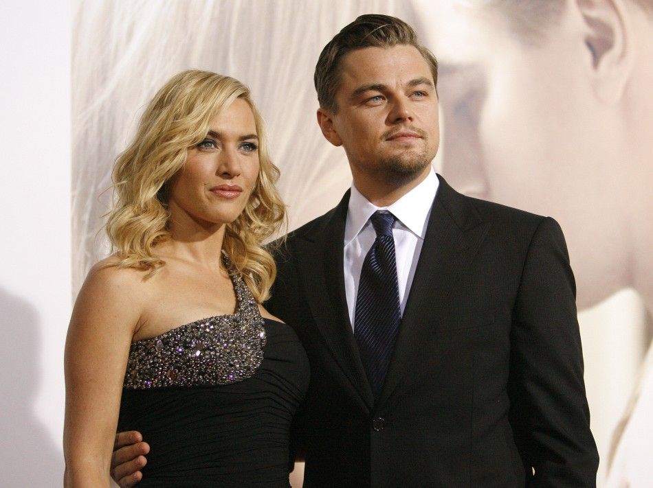 Cast member Kate Winslet poses with co-star Leonardo DiCaprio at the premiere of the movie quotRevolutionary Roadquot at the Mann Village theatre in Westwood, California December 15, 2008.