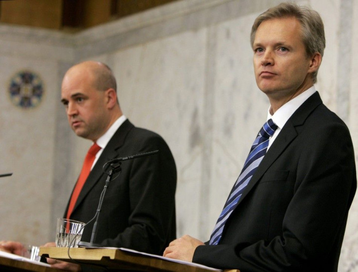 Sweden&#039;s Prime Minister Reinfeldt and Defence Minister Tolgfors during a news conference in Stockholm