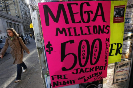 A sign advertises Mega Millions lottery tickets at a shop on New York City's Upper West Side of Manhattan