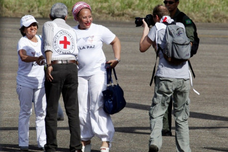 Former Colombian senator Piedad Cordoba and peace activist Gloria Cuartas at Villavicencio airport